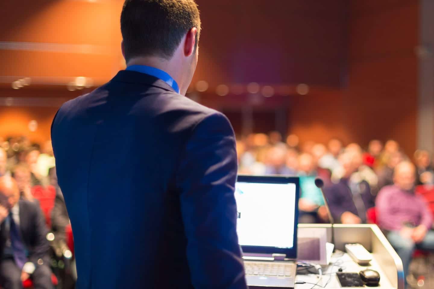 Public speaker at Business Conference.